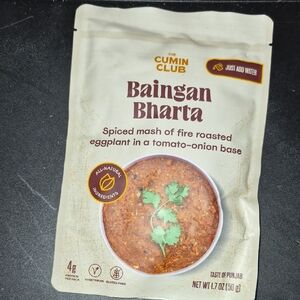 The Cumin Club Baingan Bharta Ready Meal - Cream Packaging